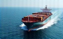 Large container ship sailing at sea.